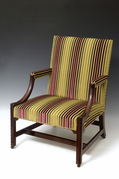 A George III Period Carved Mahogany Library Chair