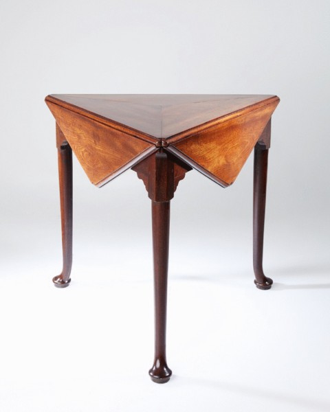 A rare George II period mahogany 'handkerchief' drop leaf table. A rare George II period mahogany 'handkerchief' drop leaf table.