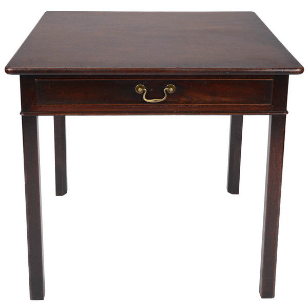 A George II period mahogany centre table. A George II period mahogany centre table.